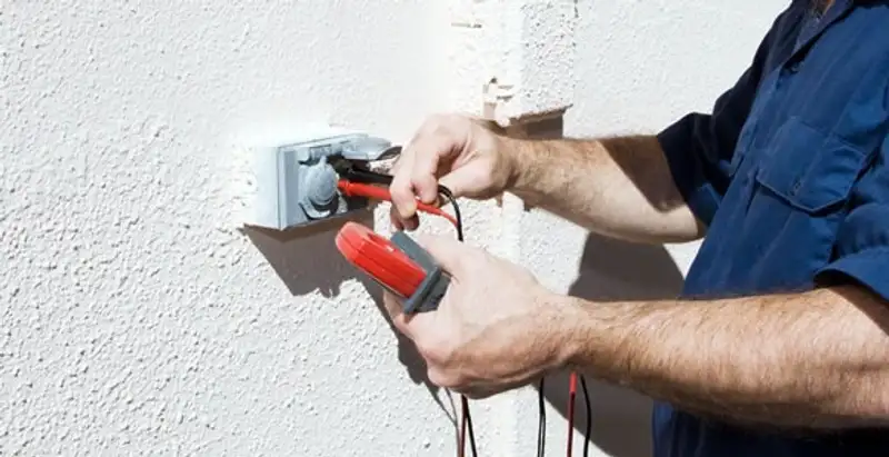 Electrician performing home electrical outlet and wiring inspection in Santa Rosa, CA