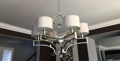 Modern chandelier installation with multiple light fixtures in Santa Rosa, CA
