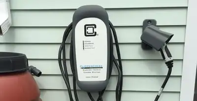 Outdoor electric vehicle charger installation on residential wall in Santa Rosa, CA